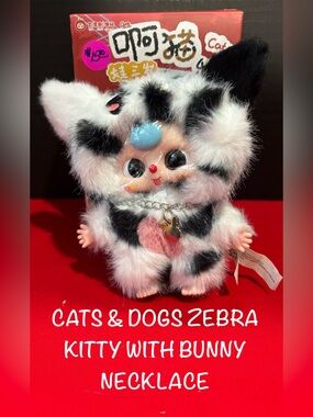 Cats & Dogs Zebra Kitty Plush Toy with Bunny Necklace - Black & White Confirmed